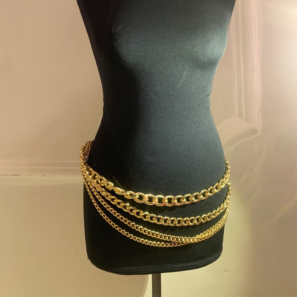 Dolce and Gabbana gold chain belt.